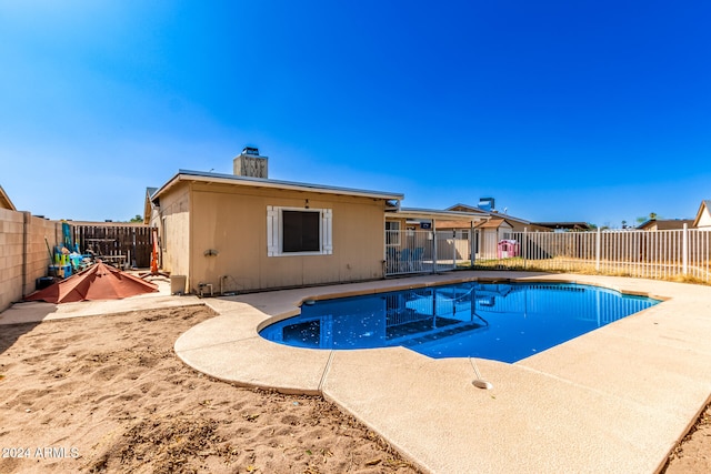 view of pool featuring a patio area