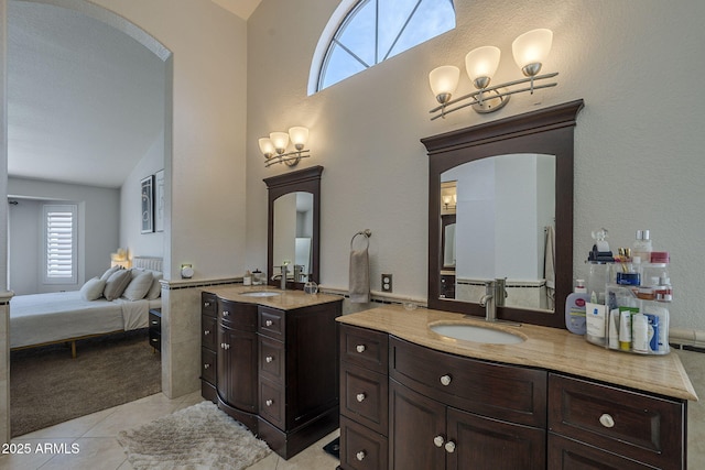 1461 W Tara Dr, Gilbert, AZ 85233 - ensuite bathroom with two vanities and tile patterned floors