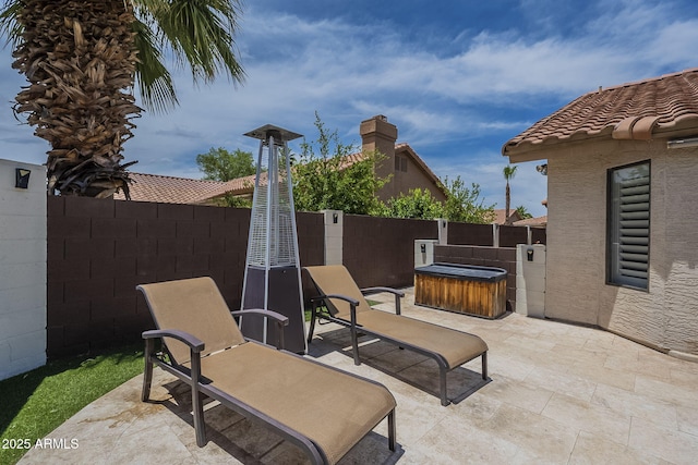 1461 W Tara Dr, Gilbert, AZ 85233 - fenced backyard with a hot tub and a patio