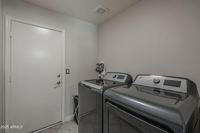 1461 W Tara Dr, Gilbert, AZ 85233 - washroom featuring independent washer and dryer and light tile patterned floors