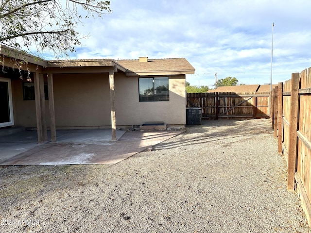 rear view of house with a patio