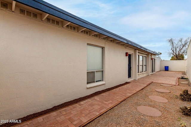 view of home's exterior with a patio