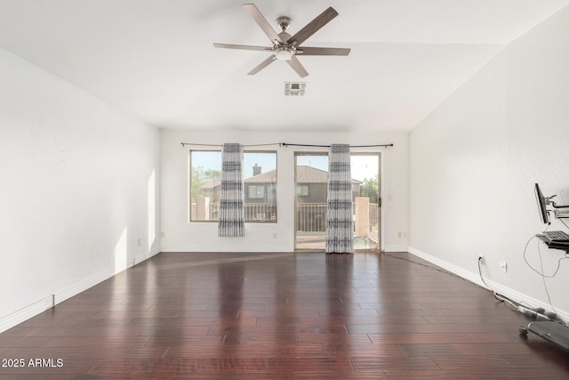 unfurnished living room featuring visible vents, baseboards, a ceiling fan, wood finished floors, and lofted ceiling