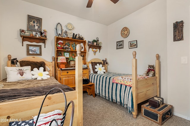 bedroom featuring light colored carpet and ceiling fan