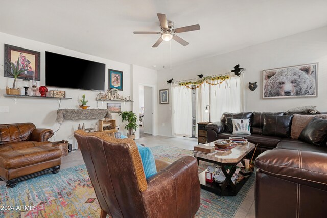 living room featuring ceiling fan