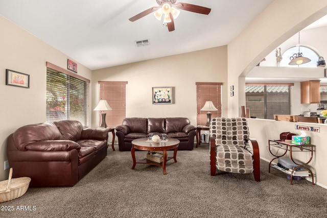 15994 W Bartlett Ave, Goodyear, AZ 85338 - living room with visible vents, ceiling fan, carpet floors, and lofted ceiling