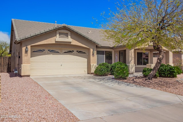 15994 W Bartlett Ave, Goodyear, AZ 85338 - ranch-style home with driveway, stucco siding, and an attached garage