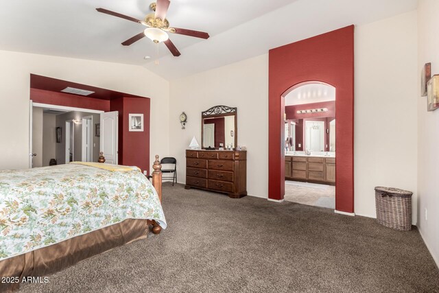 15994 W Bartlett Ave, Goodyear, AZ 85338 - bedroom with visible vents, ensuite bathroom, lofted ceiling, and carpet floors