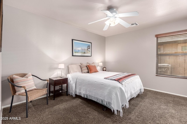 15994 W Bartlett Ave, Goodyear, AZ 85338 - bedroom with ceiling fan, baseboards, carpet, and visible vents