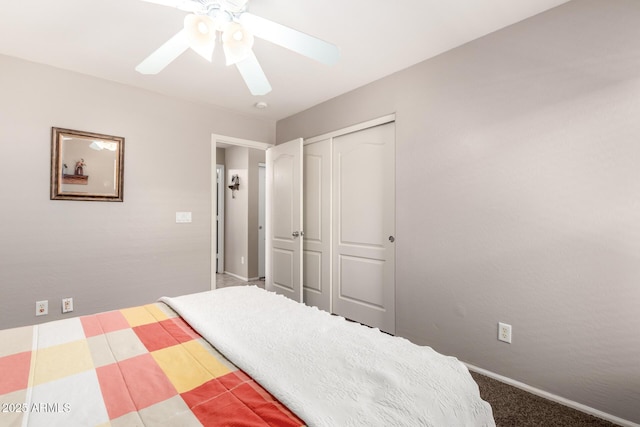 15994 W Bartlett Ave, Goodyear, AZ 85338 - carpeted bedroom with a closet, baseboards, and a ceiling fan