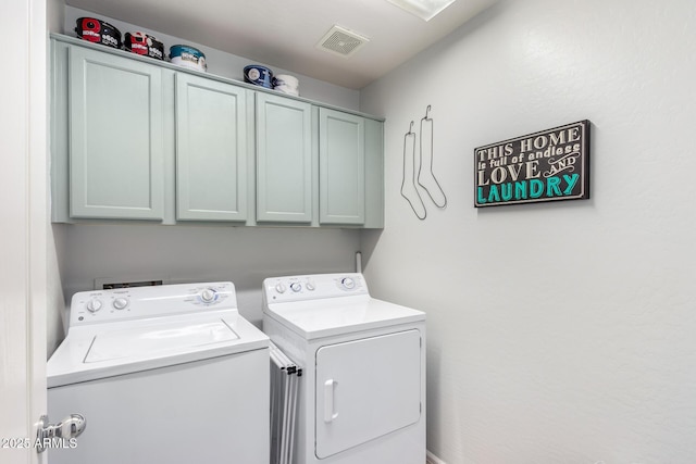 15994 W Bartlett Ave, Goodyear, AZ 85338 - laundry room featuring cabinet space, visible vents, and washing machine and clothes dryer