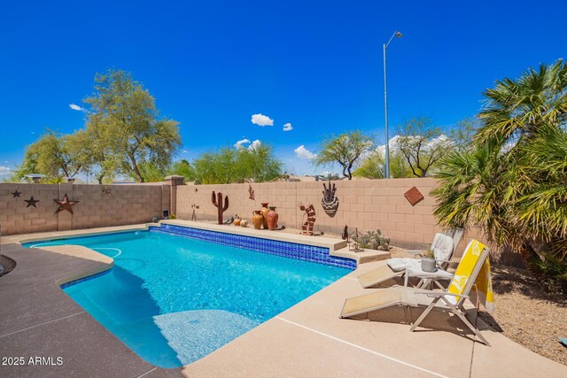 15994 W Bartlett Ave, Goodyear, AZ 85338 - view of pool with a patio, a fenced backyard, and a fenced in pool