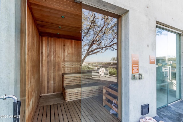 7180 E Kierland Blvd Unit 811, Scottsdale, AZ 85254 - relaxing sauna featuring wood walls, wood ceiling, and wood finished floors