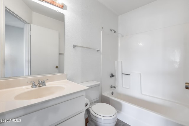 full bathroom featuring vanity,  shower combination, and toilet