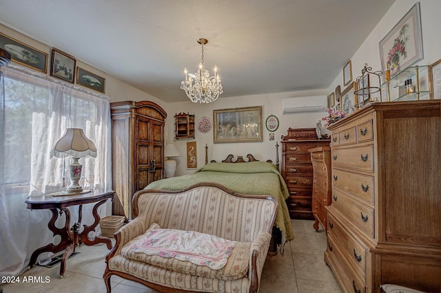 bedroom featuring a notable chandelier, light tile patterned floors, and a wall mounted air conditioner