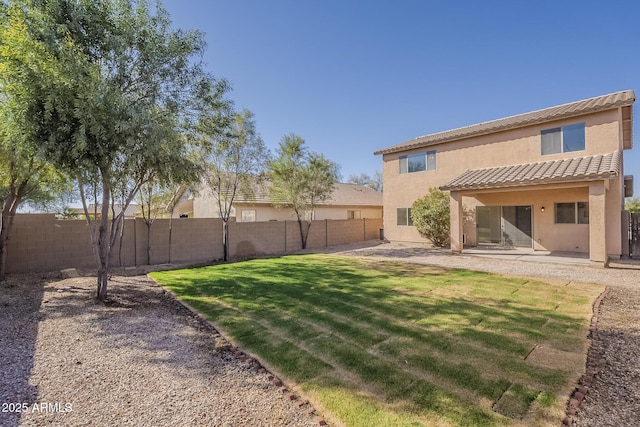 view of yard featuring a patio and a fenced backyard