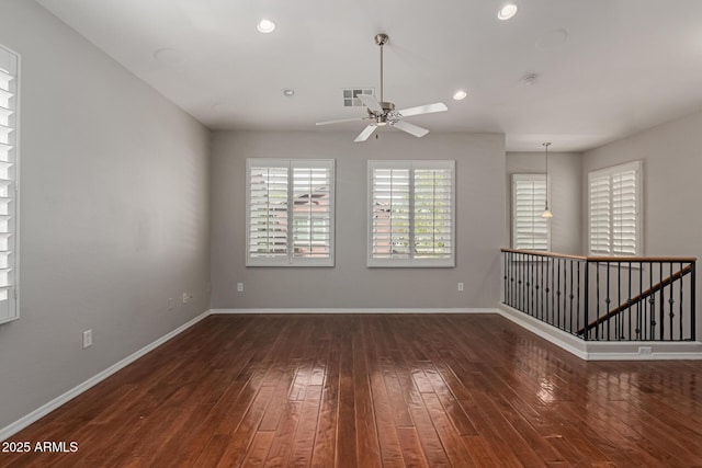 spare room with visible vents, recessed lighting, baseboards, and hardwood / wood-style floors