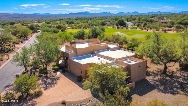 birds eye view of property featuring a mountain view