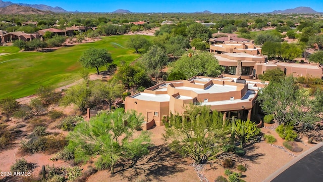 birds eye view of property featuring a mountain view