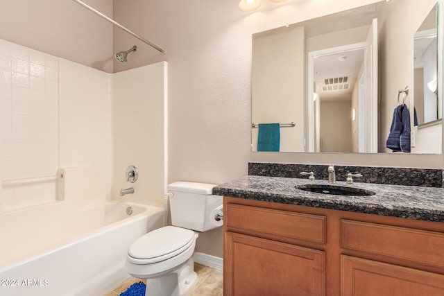 full bathroom with tile patterned floors, vanity, toilet, and shower / washtub combination