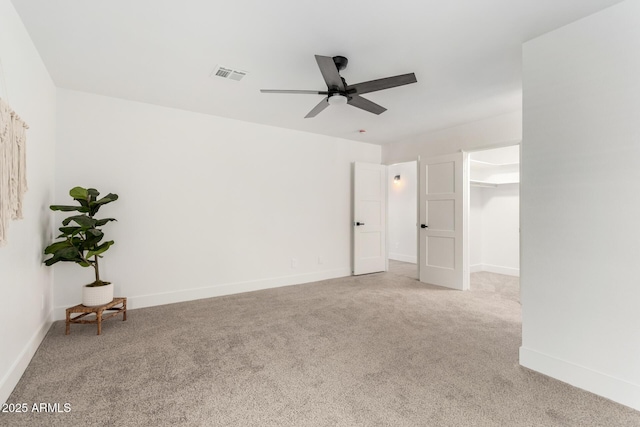 3008 S Saguaro Cir, Mesa, AZ 85202 - empty room featuring a ceiling fan, carpet, and baseboards