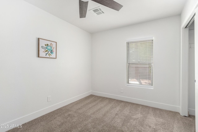 3008 S Saguaro Cir, Mesa, AZ 85202 - unfurnished bedroom featuring light colored carpet, baseboards, ceiling fan, and a closet