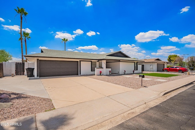 3008 S Saguaro Cir, Mesa, AZ 85202 - ranch-style house with an attached garage, driveway, stucco siding, and a shingled roof