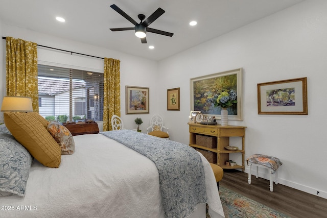 bedroom with wood-type flooring and ceiling fan