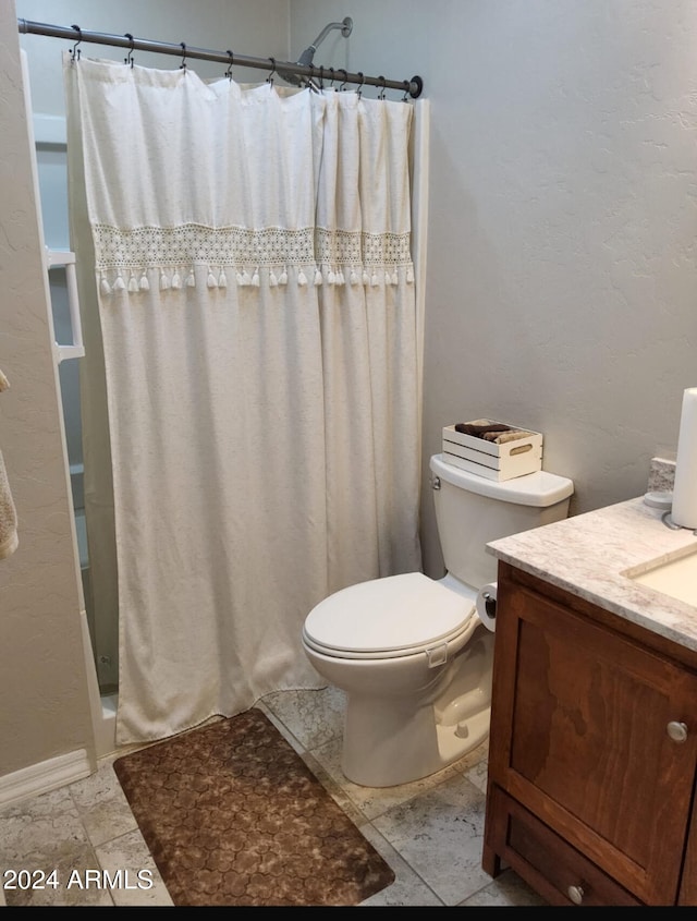 full bathroom with toilet, shower / tub combo with curtain, vanity, and tile patterned flooring