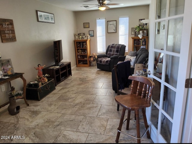 living room featuring ceiling fan