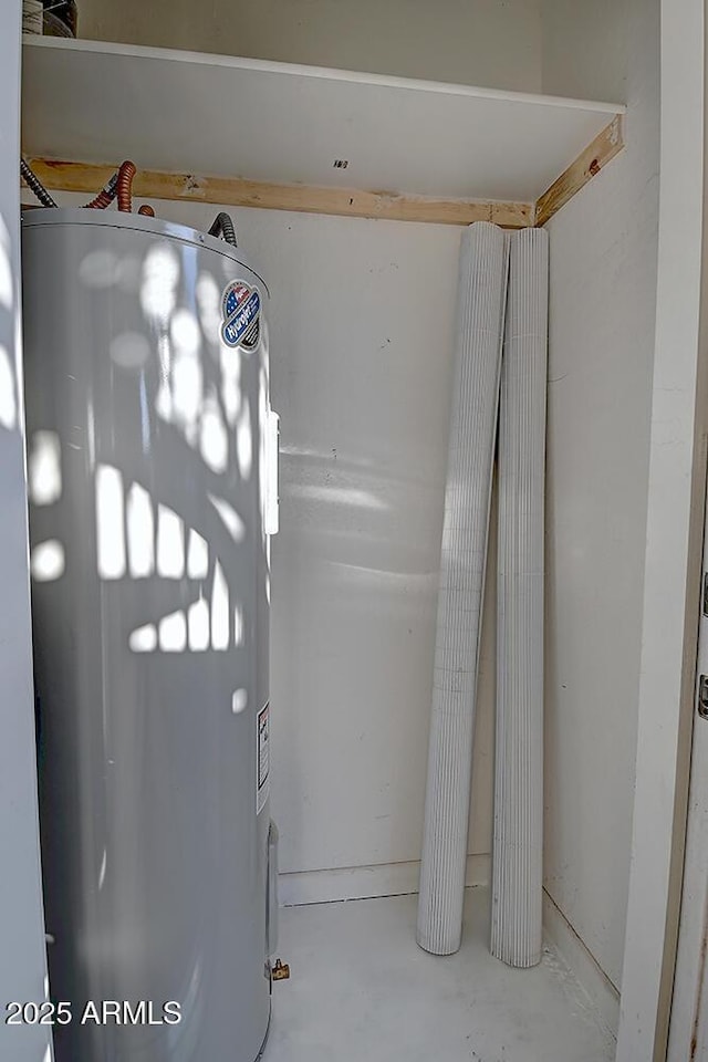 utility room with water heater