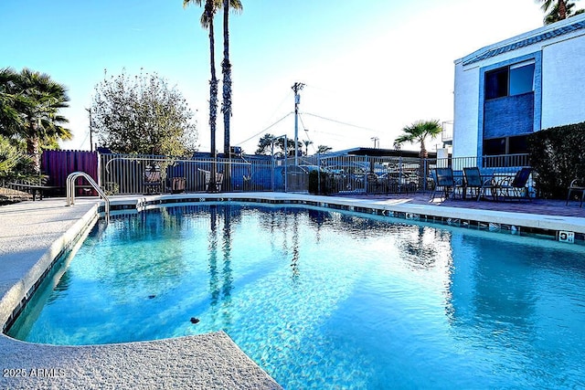 view of pool featuring a patio