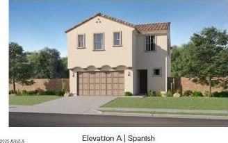 mediterranean / spanish-style home featuring a garage and a front lawn