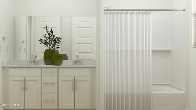 bathroom featuring vanity and walk in shower