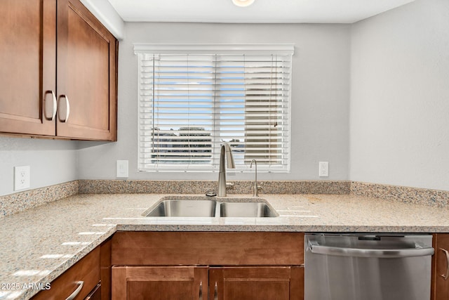1825 W Ray Rd Unit 1119, Chandler, AZ 85224 - kitchen with dishwasher, a sink, brown cabinets, and light stone counters