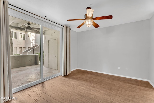 1825 W Ray Rd Unit 1119, Chandler, AZ 85224 - empty room featuring ceiling fan, wood finished floors, and baseboards