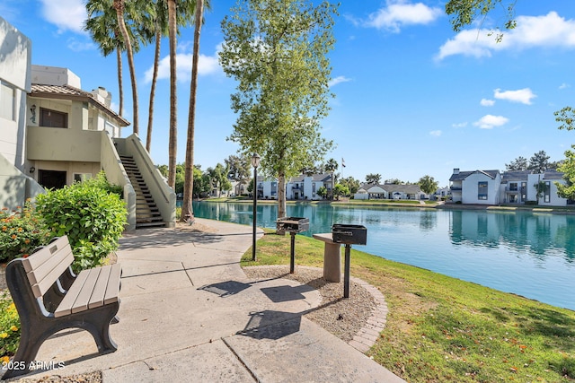 1825 W Ray Rd Unit 1119, Chandler, AZ 85224 - view of community featuring a residential view, a water view, stairs, and a lawn