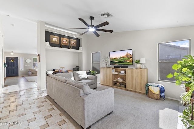 15969 W Adams St, Goodyear, AZ 85338 - living area with a ceiling fan and baseboards