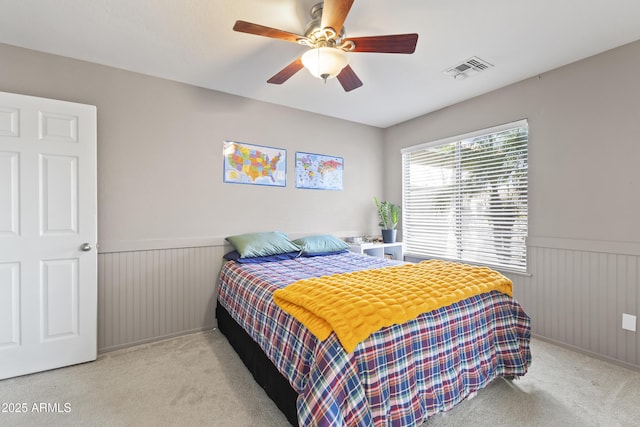 15969 W Adams St, Goodyear, AZ 85338 - carpeted bedroom featuring wainscoting and ceiling fan