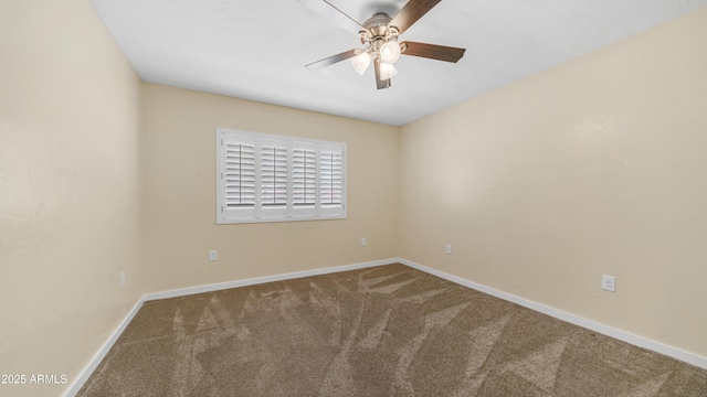carpeted empty room with baseboards and ceiling fan