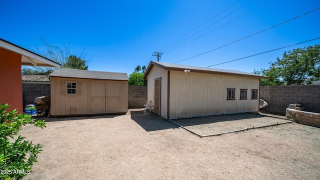 exterior space with a fenced backyard