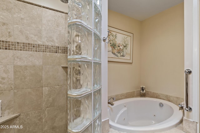 bathroom with a relaxing tiled tub