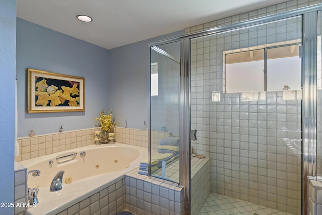 bathroom with separate shower and tub