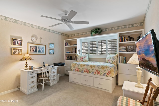 bedroom featuring light carpet and ceiling fan