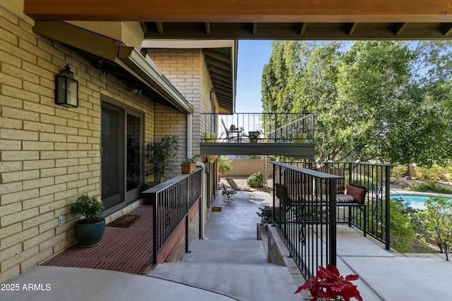 view of patio / terrace with a balcony