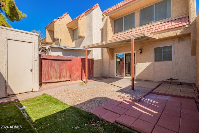 rear view of property with a patio