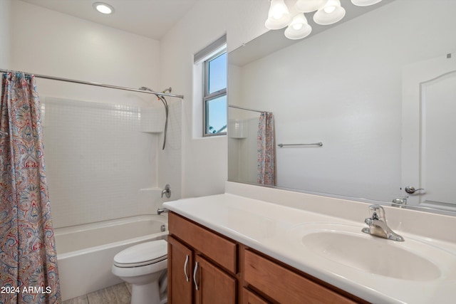 full bathroom featuring vanity, toilet, and shower / tub combo