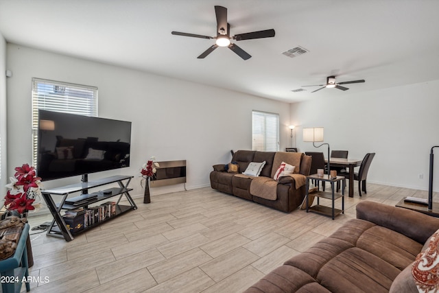 living room with ceiling fan