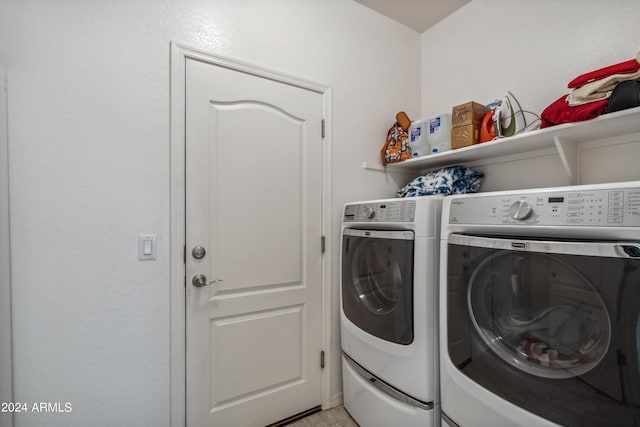 washroom with washer and dryer