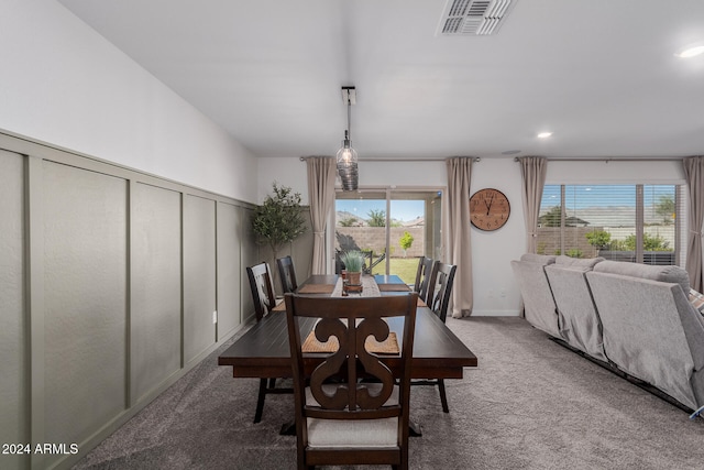 view of carpeted dining area